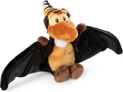 A plush toy dinosaur with wings, wearing a party hat.