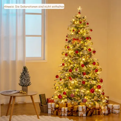 A decorated Christmas tree with gifts underneath, placed in a room with a window and curtains.