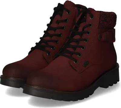 A pair of red lace-up boots.