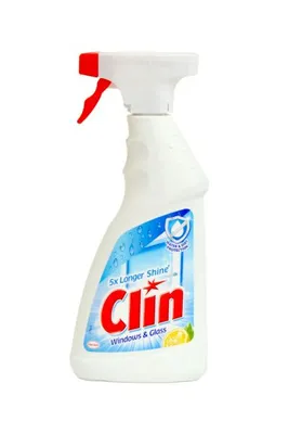 A bottle of Clin Windows & Glass cleaner with a lemon scent.