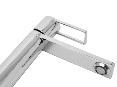 A close-up, studio shot of a modern chrome faucet against a white background.