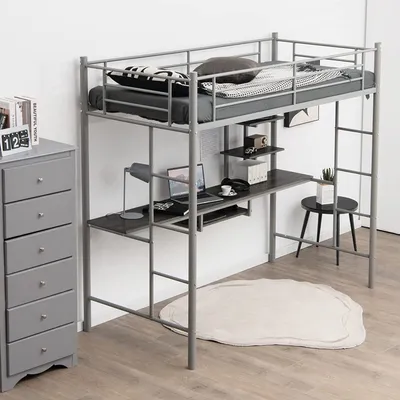 A loft bed with a desk and shelves is set up in a room with a dresser and a rug.