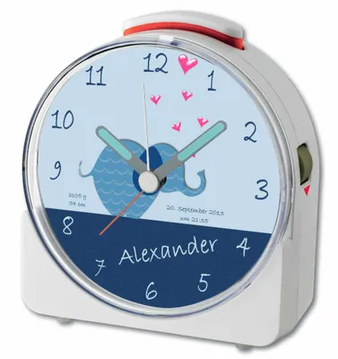 A close-up view of a children's alarm clock with an elephant design.