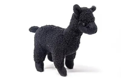 A black plush alpaca toy is shown standing against a white background.