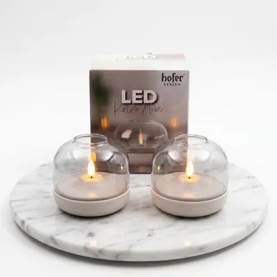 Immagine prodotto di Candele LED in vetro Hofer – confezione da 2 – "MIRA" – Candele decorative a LED con fiamma artificiale, alimentate a batteria – Decorazioni moderne per tavoli, ideali per soggiorno, camera da letto e balcone