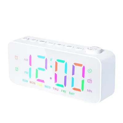 A white digital alarm clock with a colorful display.