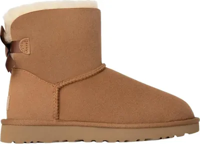 A single brown Ugg boot with a bow on the back, shown from the side against a white background.
