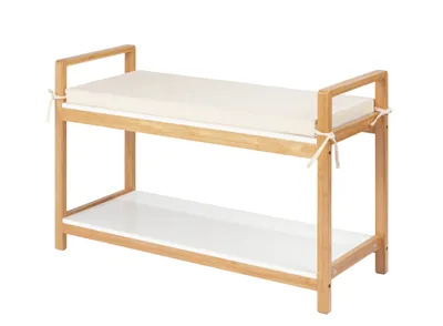 A shoe rack with a cushioned seat.