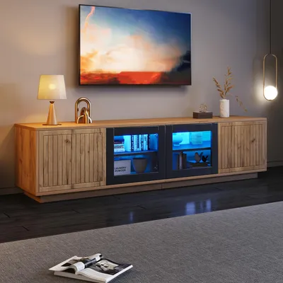 Image de okwish Meuble TV avec 4 portes et bandeaux LED, meuble TV pour TV jusqu'à 75 pouces, bois naturel + noir