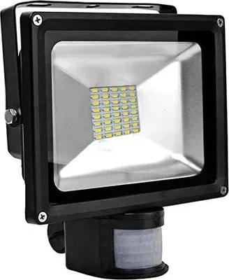A black LED floodlight with a motion sensor attached to the bottom, shown against a white background.