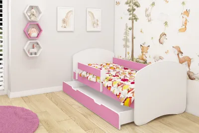 A child's bed with a pull-out trundle, set in a room with decorative wall art and shelves.