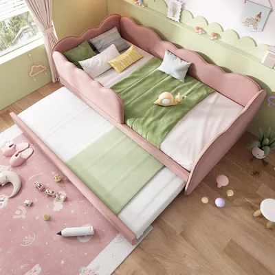 A child's bedroom with a pink daybed and pull-out trundle bed, decorated with soft toys and a pink rug.
