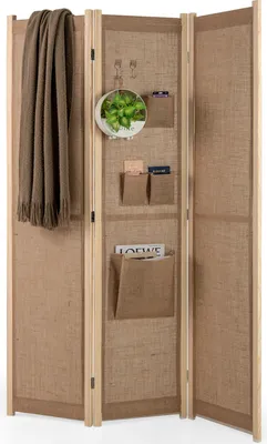 A three-panel room divider with storage pockets and a hanging scarf.