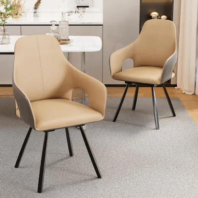 Two beige dining chairs with dark gray accents and black metal legs are shown in a dining room setting.
