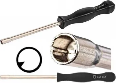 A carburetor adjustment tool with a black handle and a silver shaft, shown with a close-up of the tool head and a circular diagram.
