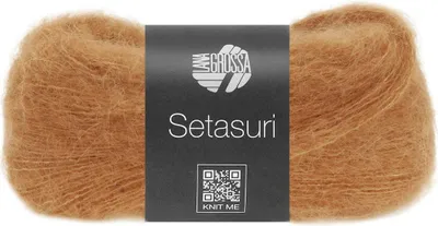 A ball of yarn with a product label.
