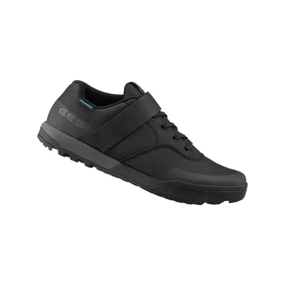 A black Shimano MTB cycling shoe is shown against a white background.