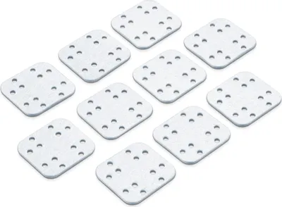A collection of square-shaped white pads with multiple small holes, arranged diagonally on a white background.