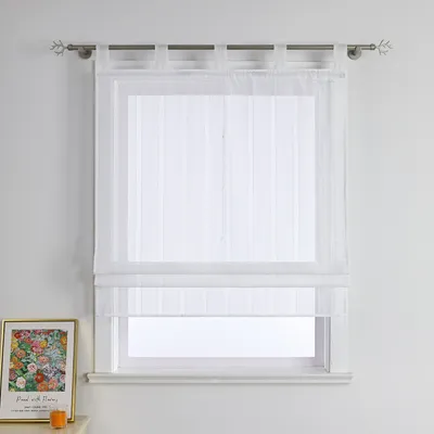 A white sheer roman blind with vertical stripes is shown hanging on a window.