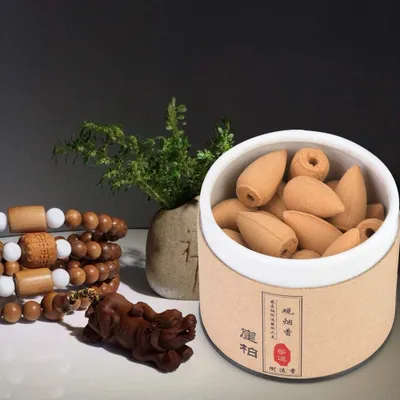 Produktbild von Duftende Korrel Sandelholz Zuhause Natürliche Kegel Räucherstäbchen Grüner Tee Räucherstäbchen Reflow (Zeder Zypresse)