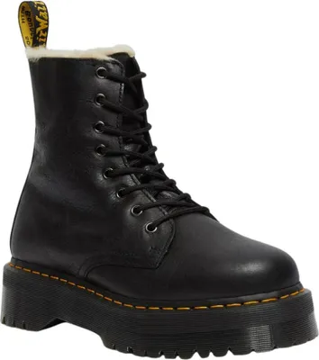 A studio shot of a single black boot.