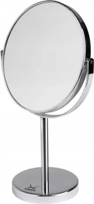 A silver-colored cosmetic mirror with a round reflective surface, mounted on a stand with a circular base.