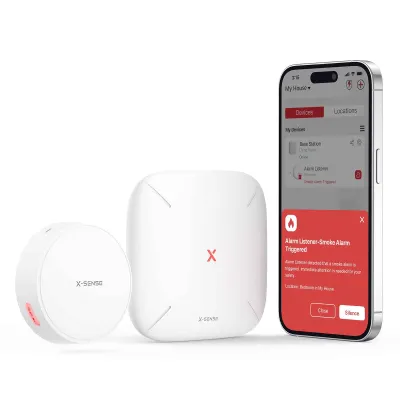 A smart alarm listener set, including a listener and a base station, is displayed next to a smartphone showing the app interface with an alert.