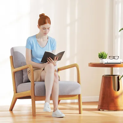 Imagen del producto de Sillón de estar elegante, con estructura de madera y acolchado de espuma, apariencia de terciopelo, ideal para salones o dormitorios, color gris