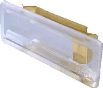 A close-up product shot of a clear plastic name tag holder with a gold metal clip.