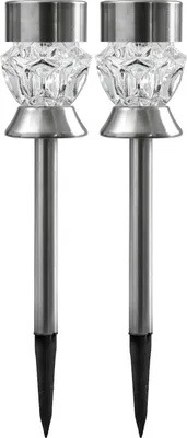 Two solar garden lights with stainless steel bases and clear, faceted glass tops.