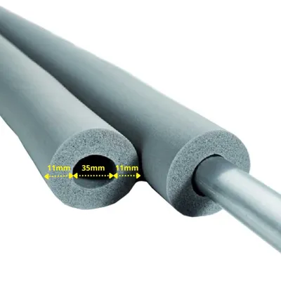 Close-up view of two pieces of gray foam pipe insulation, one with dimensions indicated.