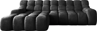 A dark gray sectional sofa is shown against a white background.