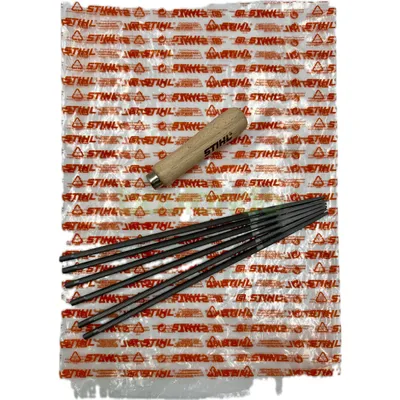 A set of STIHL chainsaw files and a wooden handle, laid out on a white background over a clear plastic bag with STIHL branding.