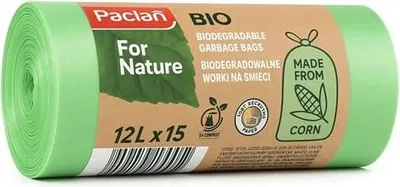 A roll of green biodegradable garbage bags with packaging.
