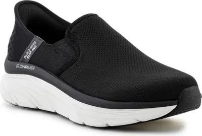 A black Skechers slip-on sneaker with a white sole, shown from a side angle against a white background.