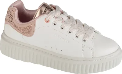 A single white sneaker with rose gold accents and rhinestones.