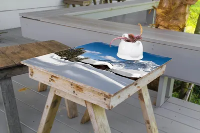 Produktbild von Wallario selbstklebende Möbelfolie/ Tischdecke für Innen und Außen, Größe: 50 x 50 cm - Verschneiter Almhütten vor einem Gipfel