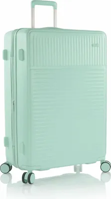 A mint green suitcase with four wheels and a retractable handle.