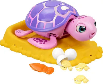 A toy turtle and its babies on a yellow sandy base.