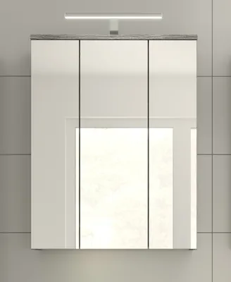 A bathroom cabinet with mirrored doors and integrated lighting.