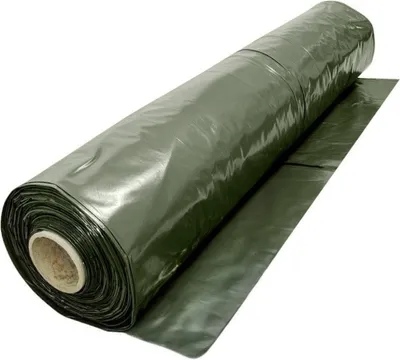 A roll of green construction film is shown on a white background.