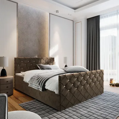 A luxurious bedroom with a large, tufted bed as the centerpiece.