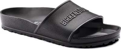 A black Birkenstock slide sandal is shown from a side angle on a white background.