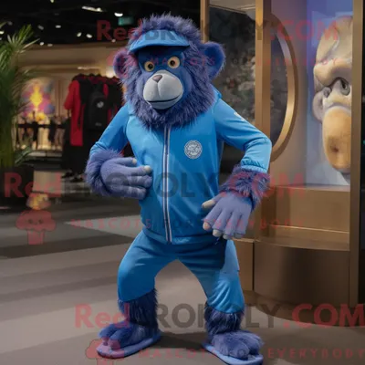 Immagine prodotto di Personaggio mascotte REDBROKOLY di un babbuino blu vestito con pantaloni da jogging e berretto