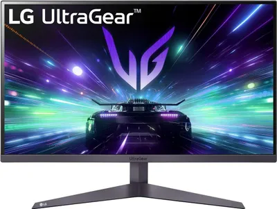 A gaming monitor displaying a futuristic car and abstract graphics.