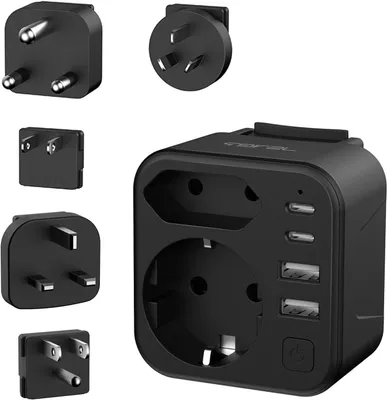 Produktbild von Reiseadapter mit USB – Universelle Steckdosen – Für Reisen ins Ausland – 6 Anschlüsse gleichzeitig – 7 x 6,8 x 5 cm