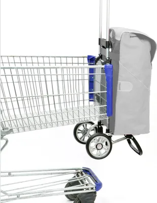 A close-up side view of a shopping trolley with a gray fabric bag attached.