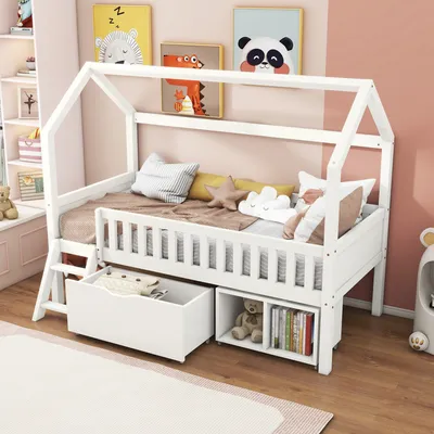 A child's bedroom with a white house-shaped bed.