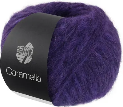 A ball of purple yarn with a black label.