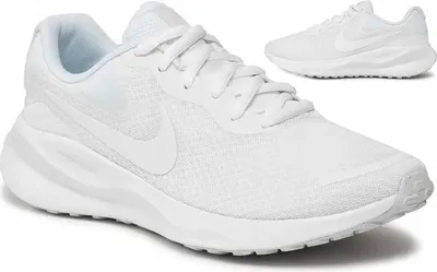 A pair of white Nike Revolution 7 women's shoes are shown from a side angle, with a second shoe visible in the background.